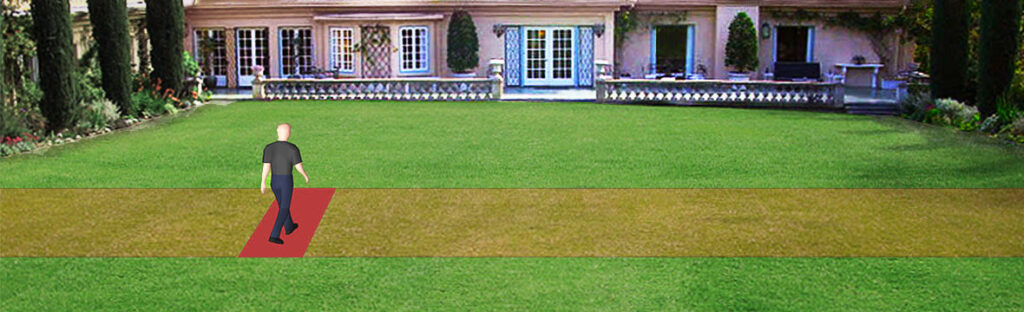 Trespasser walking on lawn in luxury residence
